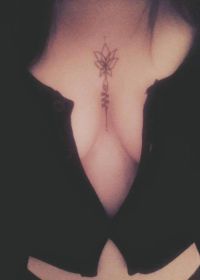 Tattoo between the breasts