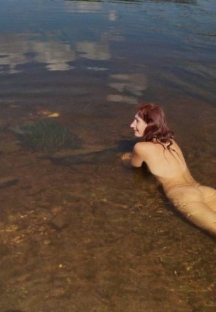 Naked on the river