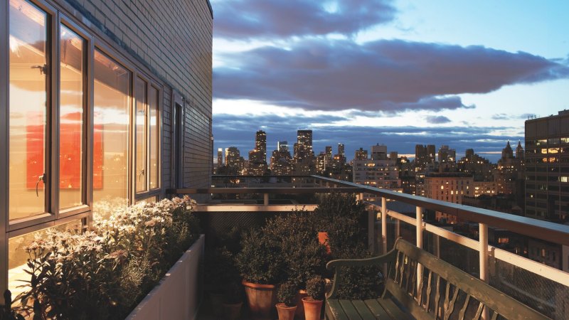 The balcony at night is the background