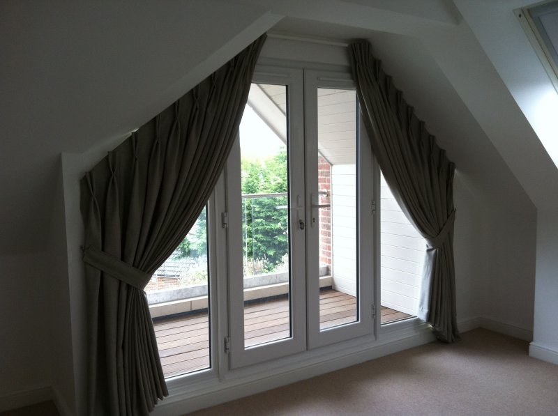 Curtains on triangular attic windows