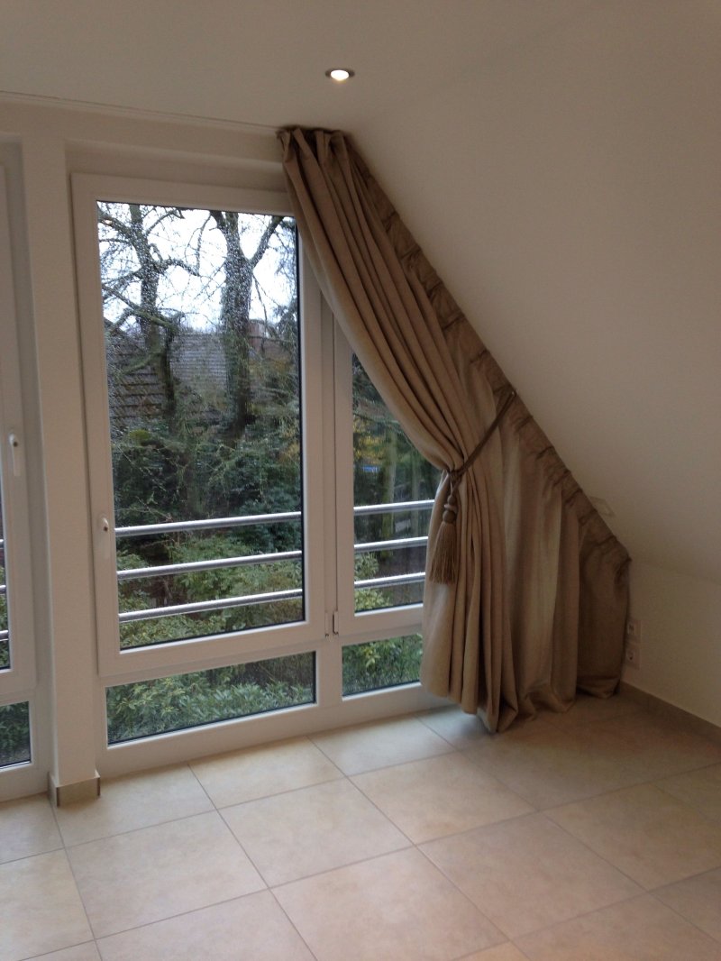 Curtains on triangular attic windows