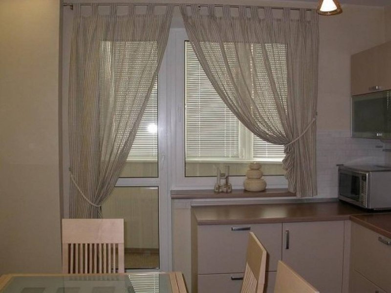 Curtains for the kitchen with a balcony