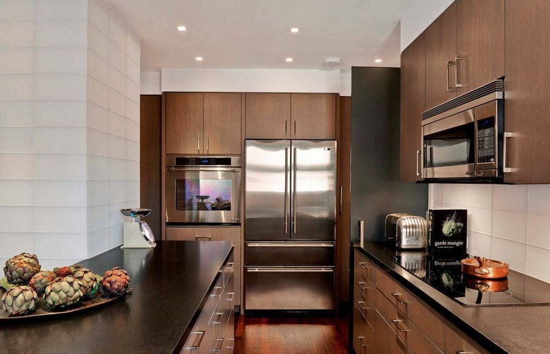 Kitchen with a large refrigerator