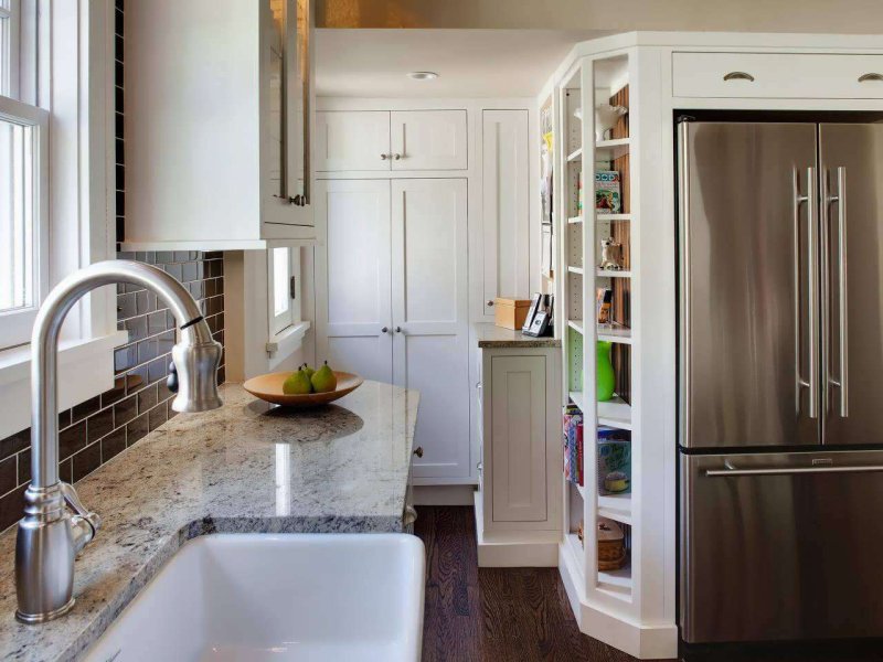 Refrigerator in the interior of the kitchen