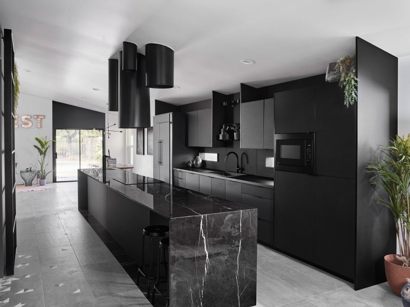 Black kitchen in the interior