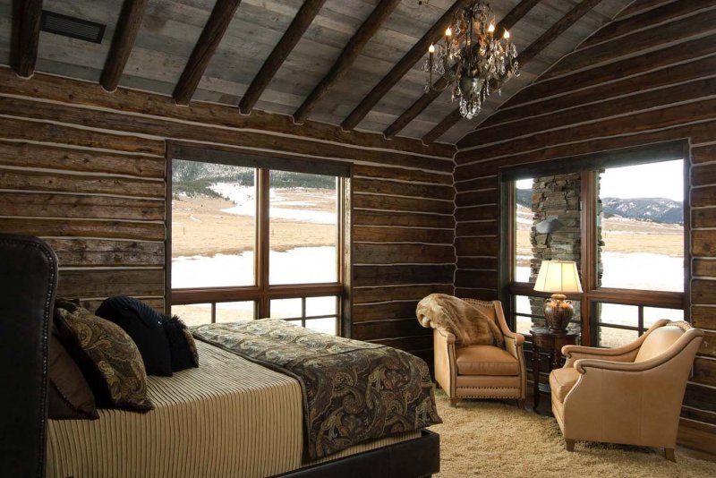 Bedroom interior in a wooden house