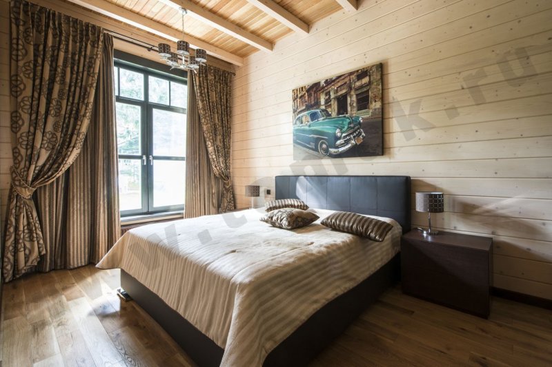 Bedroom interior in a wooden house