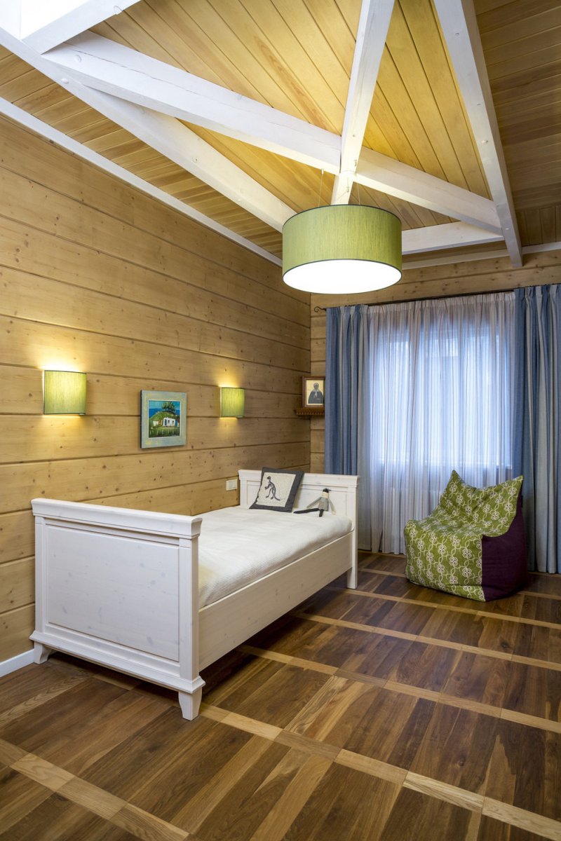 Bedroom in the house from the timber interior