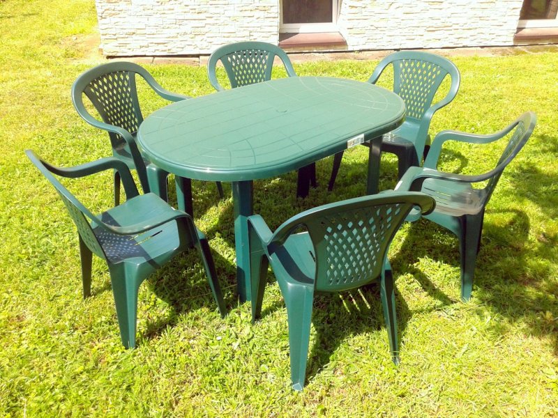 Plastic table and chairs for a summer residence