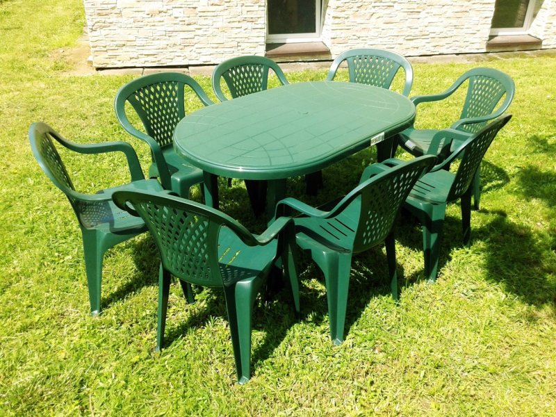 Plastic table and chairs for a summer residence