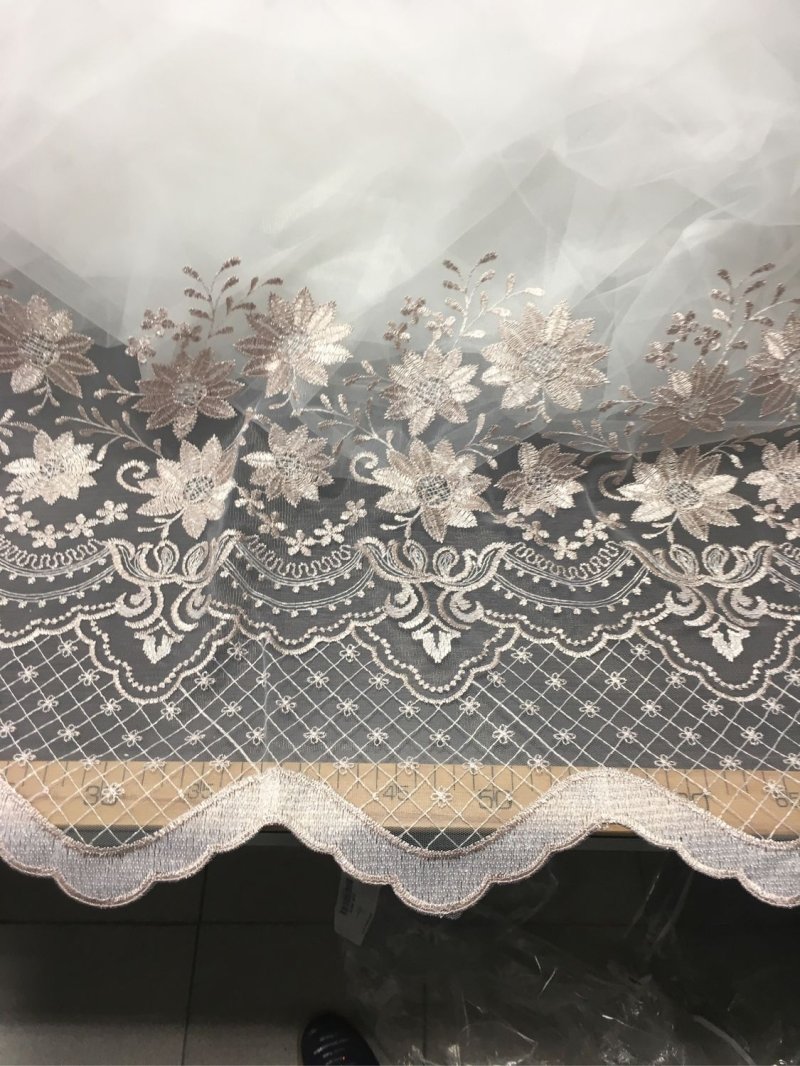 Tulle grid with embroidery