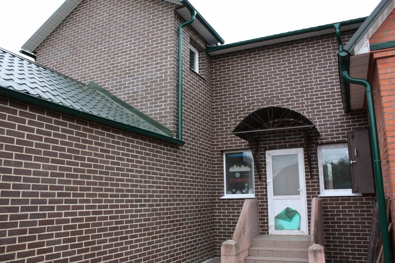 The facade of the house from thermal panels