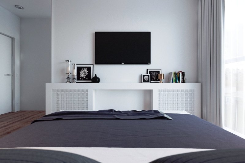 TV on the wall in the bedroom