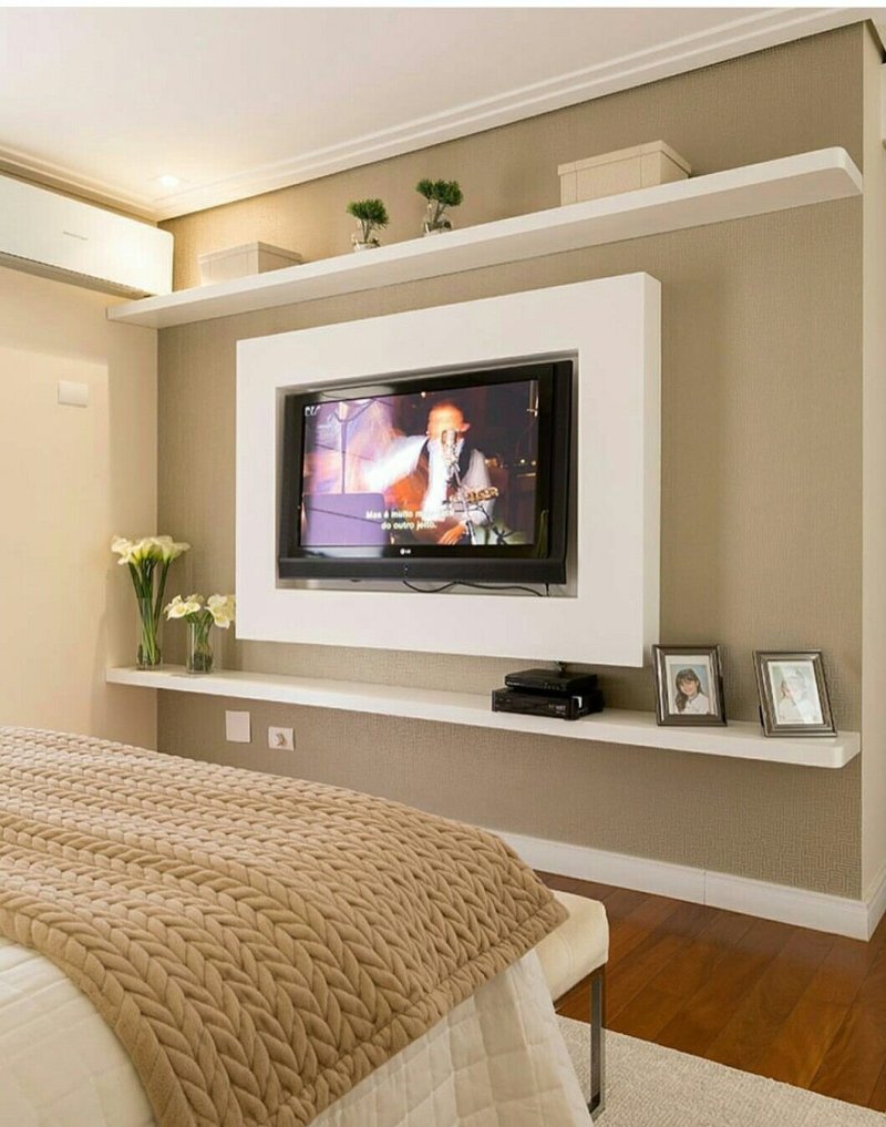 TV on the wall in the bedroom