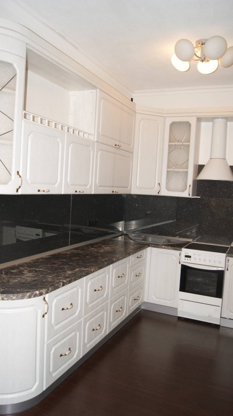 White kitchen dark countertop