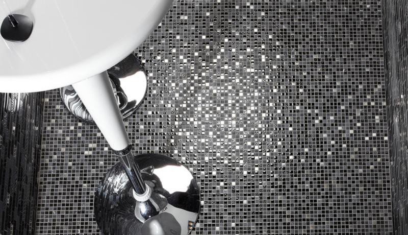 Black mosaic in the interior of the bathroom