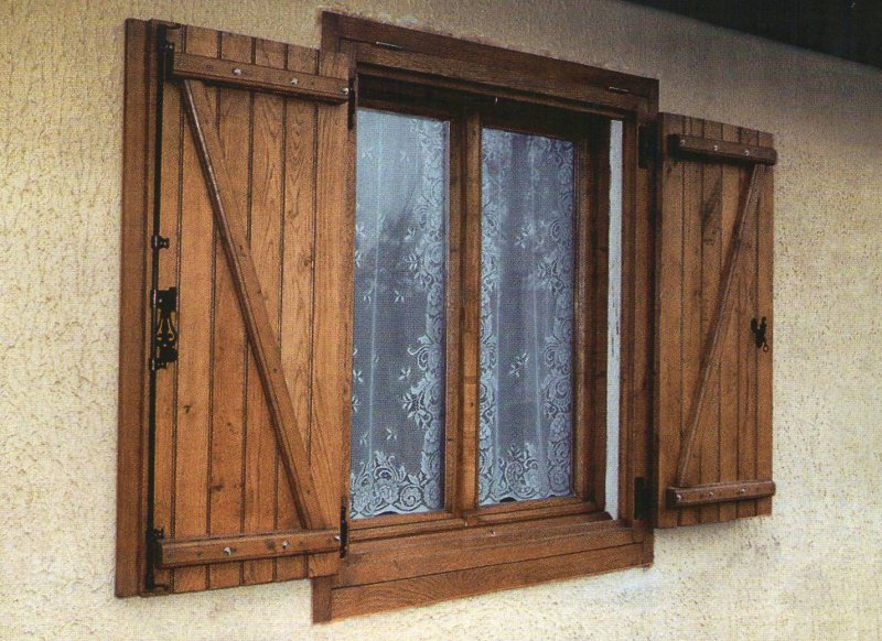 Shutters on the windows of wooden old