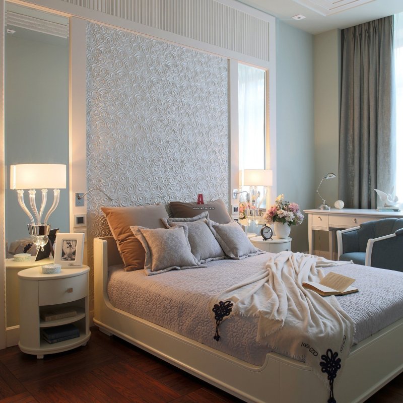 Beige bed in the interior of the bedroom