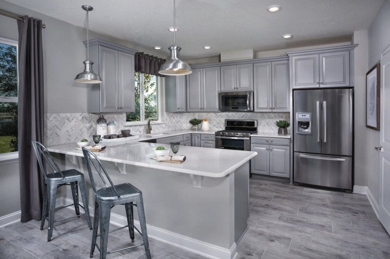 Gray kitchen in the interior