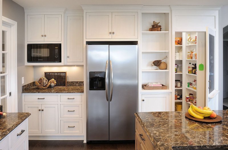 Refrigerator in the interior of the kitchen