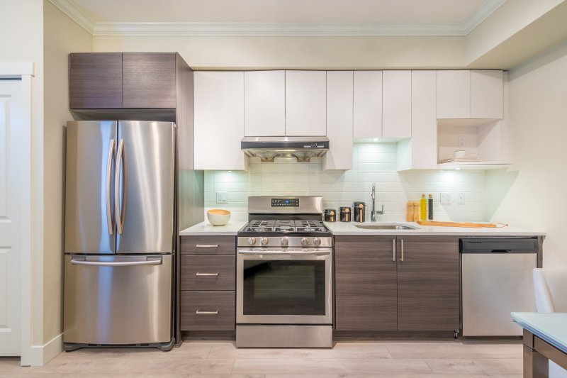 Kitchen with a large refrigerator