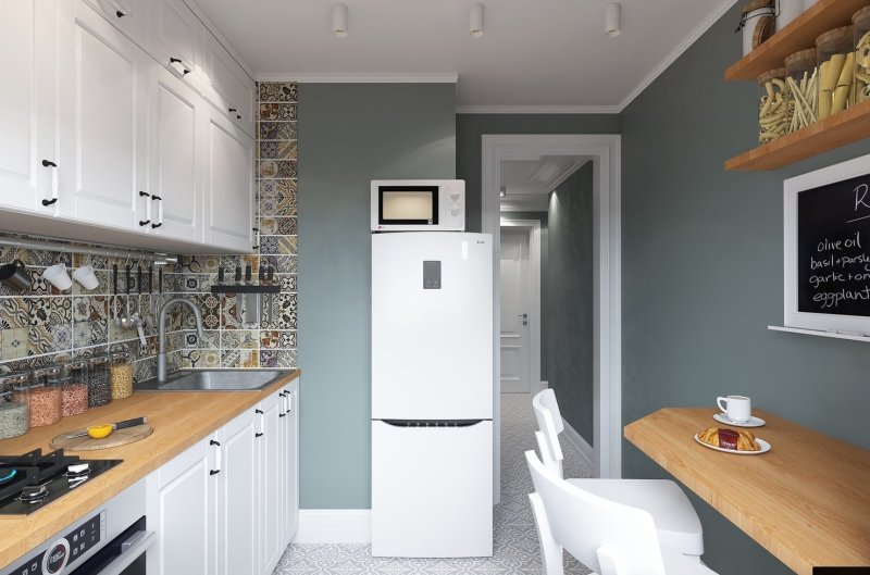 Kitchen with a white refrigerator