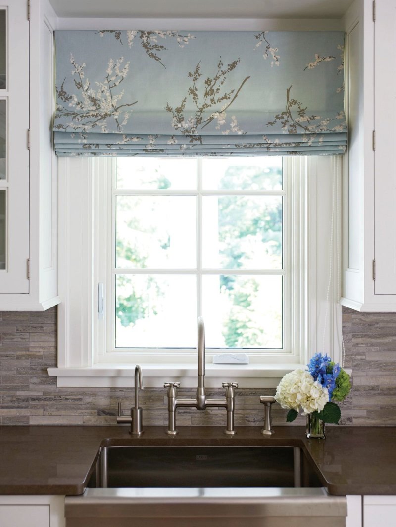 Roman curtains in the interior of the kitchen