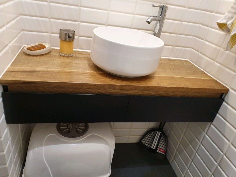 Wooden countertop to the bathroom