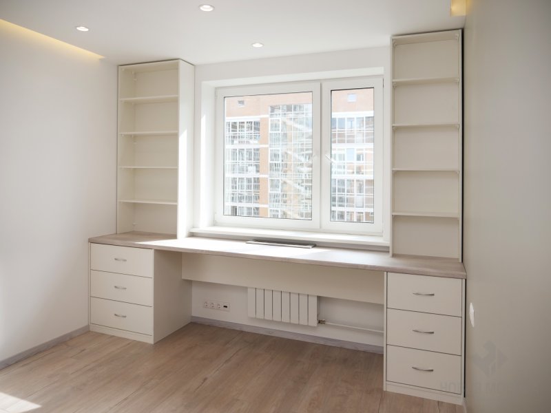 Wardrobe by the window with the table