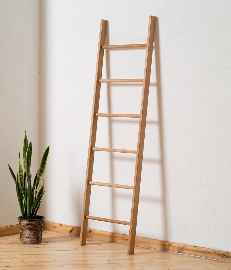 A wooden staircase of a ladder