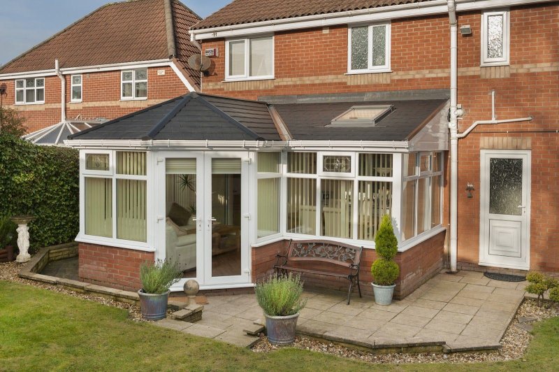 Covered veranda attached to the house