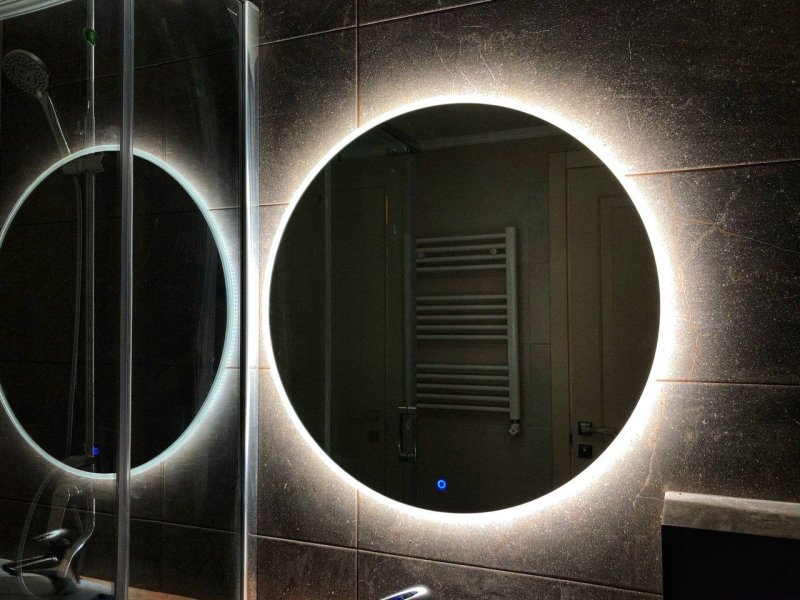 Mirror in the bathroom with illumination