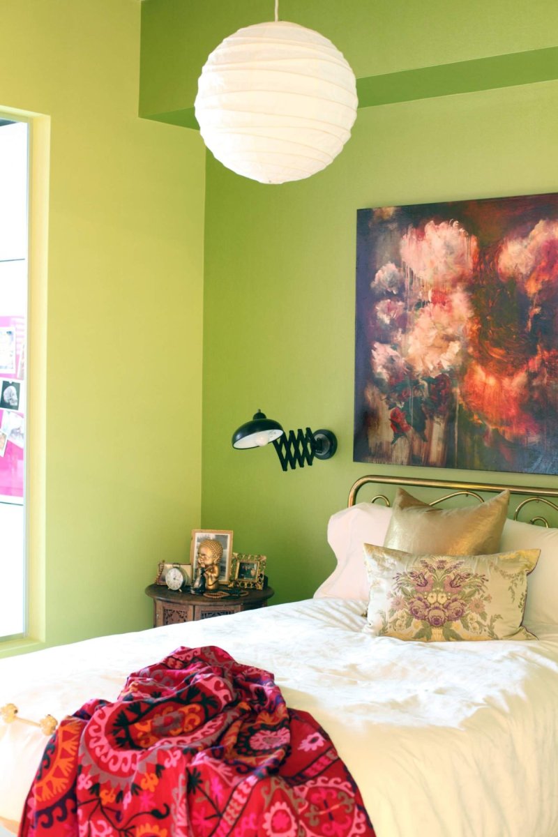 The green interior of the bedroom