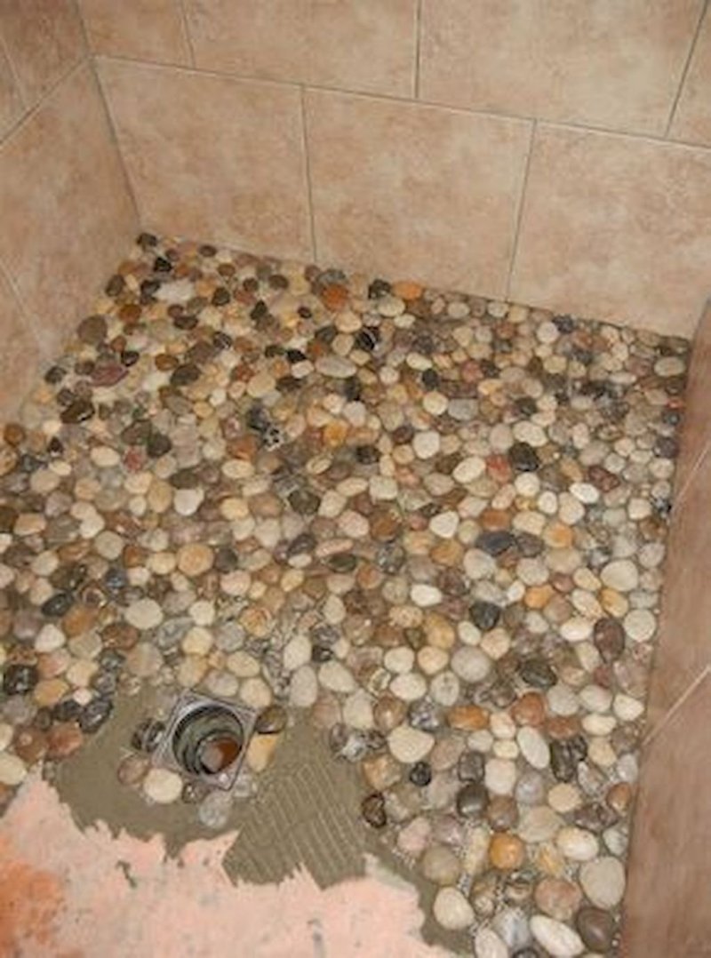 Paul in shower from pebbles