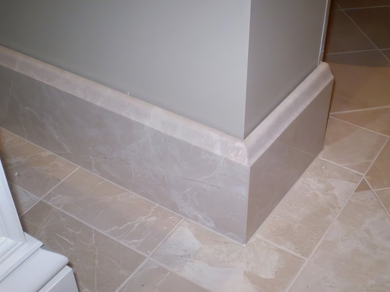 Skirting board from ceramic tiles