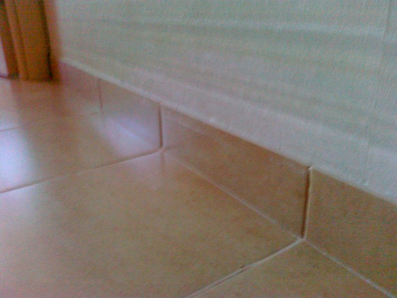 Floor skirting board from tiles