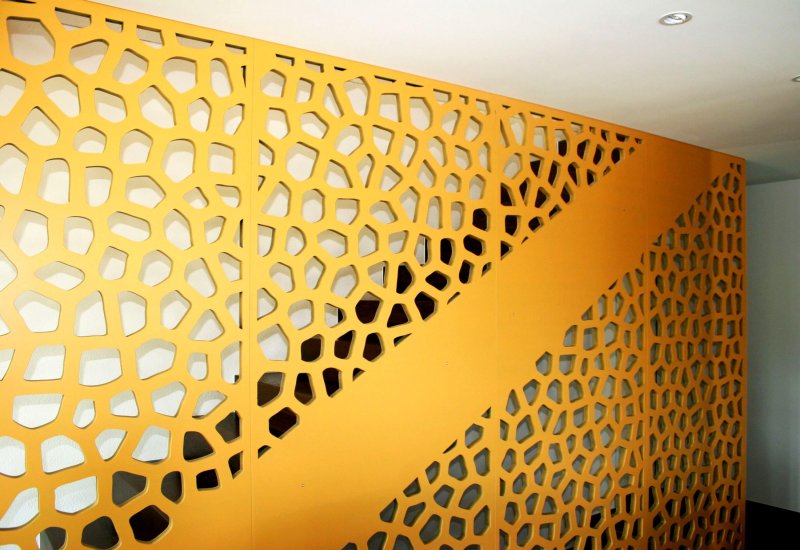 Perforated panel on the wall