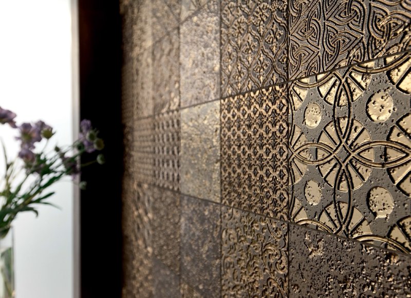 Embossed tiles for walls