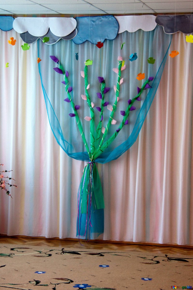 Decoration of the hall by spring in kindergarten