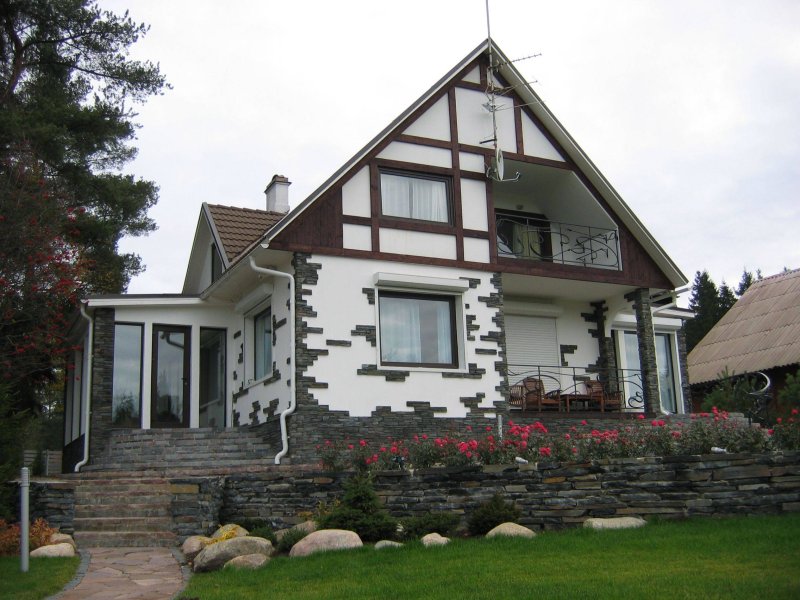 Facade of the house with stone