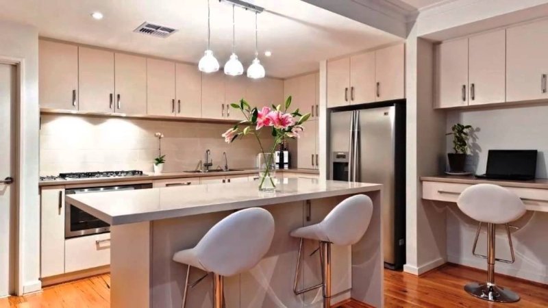 Kitchen with a bar table