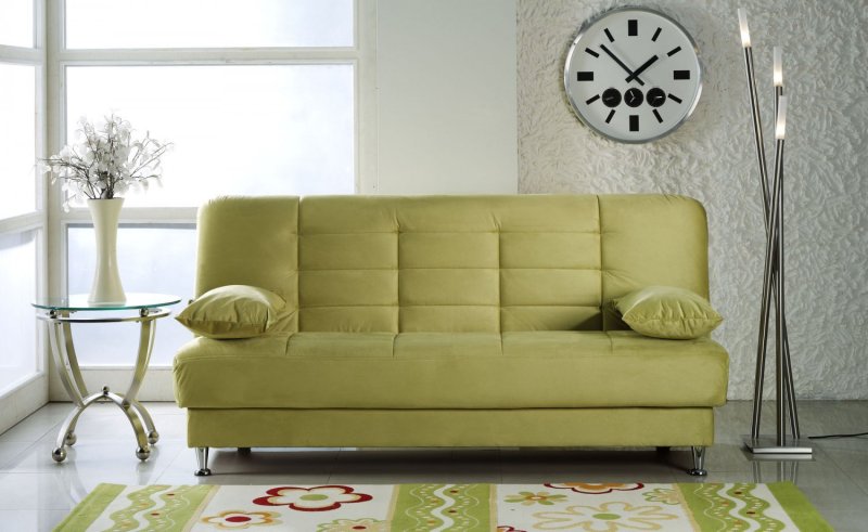 Olive -colored sofa in the interior