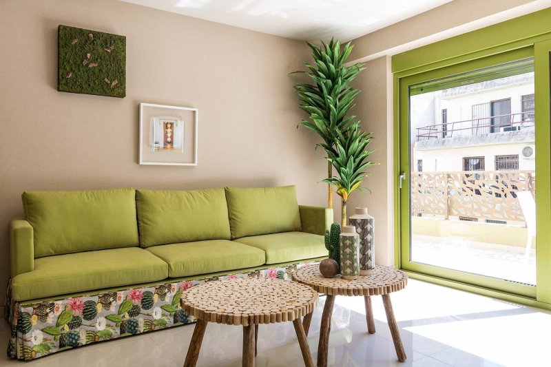 Green sofas in the interior