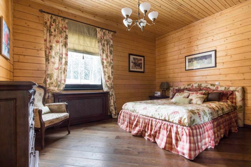 Bedroom interior in a wooden house