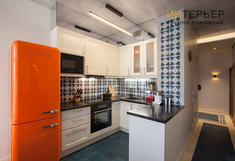 Refrigerator in the interior of the kitchen