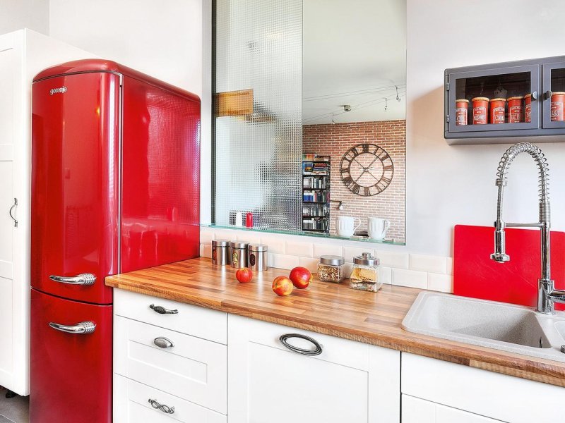 Refrigerator in the interior of the kitchen