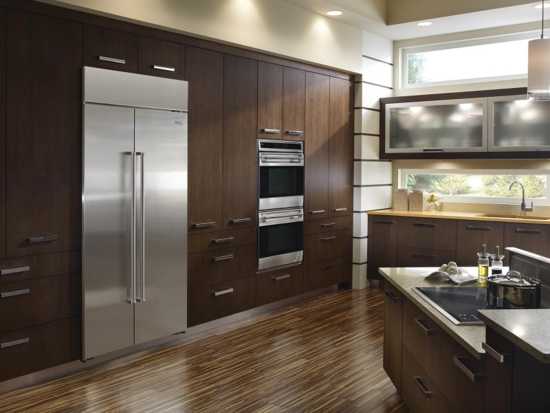 Kitchen with a large refrigerator