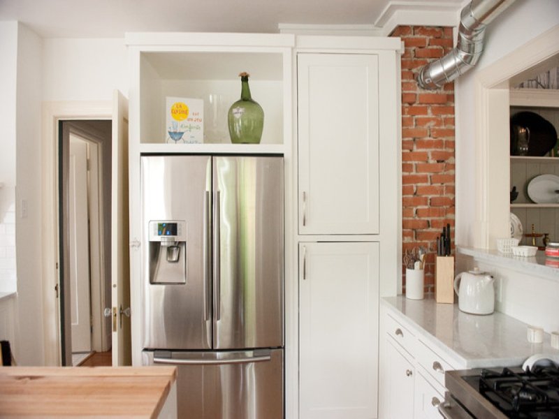 Refrigerator in the interior of the kitchen