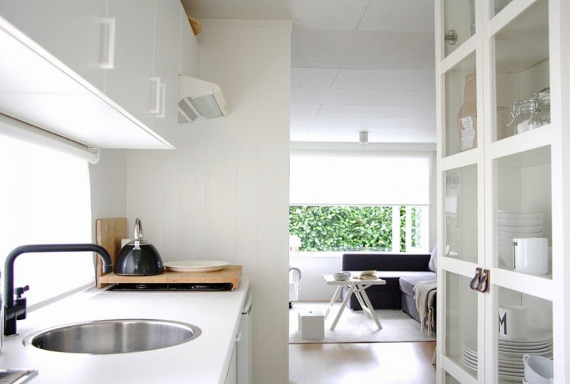 The interior of a narrow kitchen