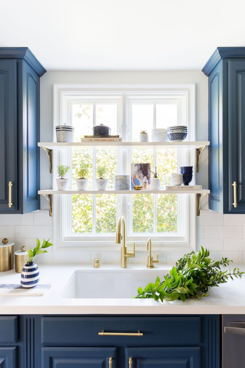 Blue kitchen with open shelves